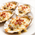 Cheese-baked oysters on a plate